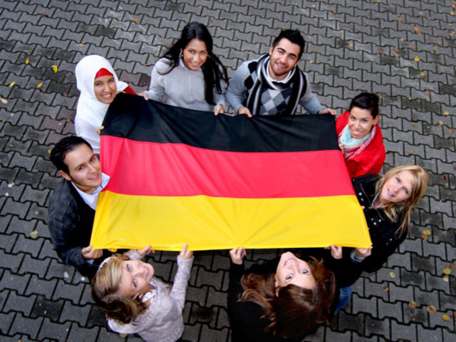 В Германии число жителей с миграционным фоном выросло за год на 4,4%