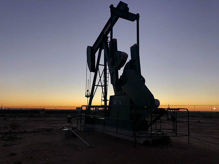 Альберта приняла болезненное решение о сокращении добычи нефти